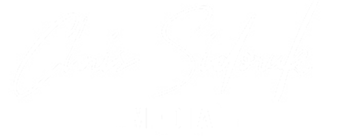 Primary navigation logo (white signature wordmark)
